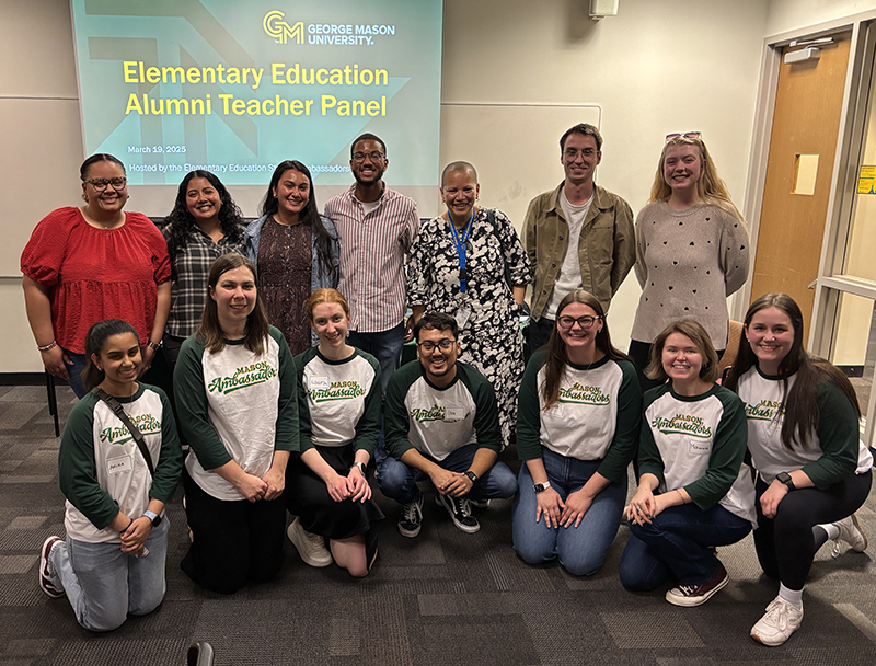 Photo of 2 rows of 7 people each in front of a projector that reads Elementary Education Alumni Teacher Panel